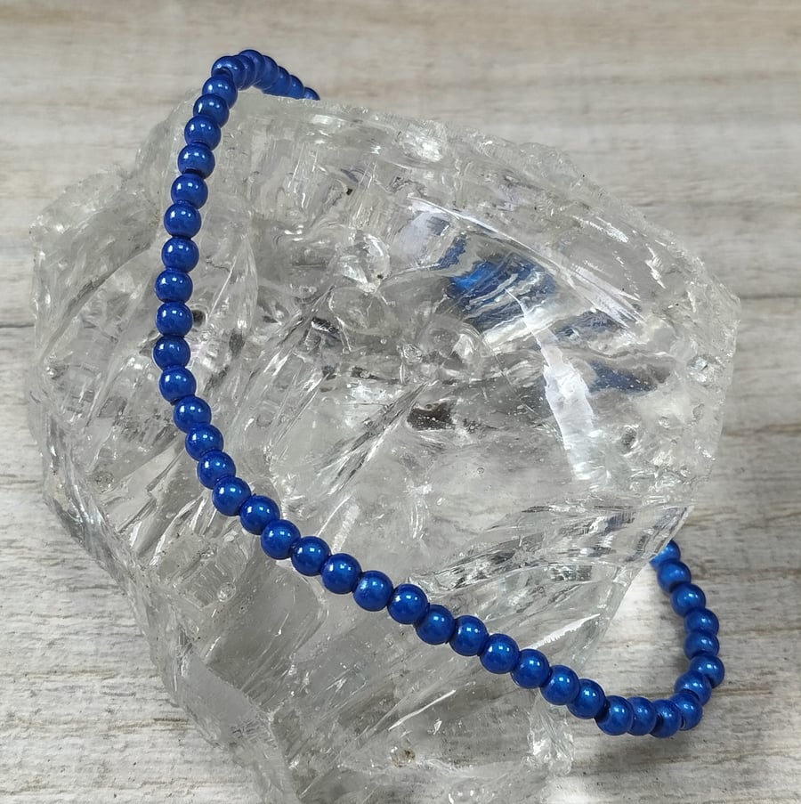 AL95c Blue miracle bead elasticated anklet, 11.5"