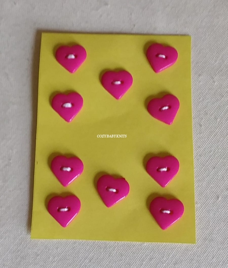 Cerise pink heart buttons