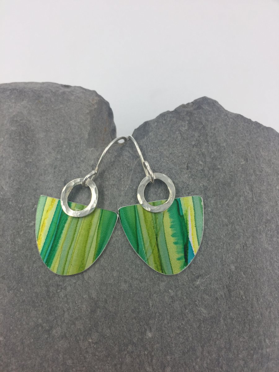 Stripy shades of green dangly earrings with hammered silver ring.