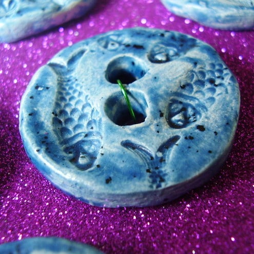 SEVEN CHUNKY CERAMIC BUTTONS