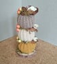 Crochet stacking pumpkins on a log base. Autumn decoration 