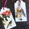 Pretty bird and feather bag charm and tag.