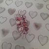 SHADES OF PINK AND SILVER FLORAL DRAGON FLY BAG CHARM.