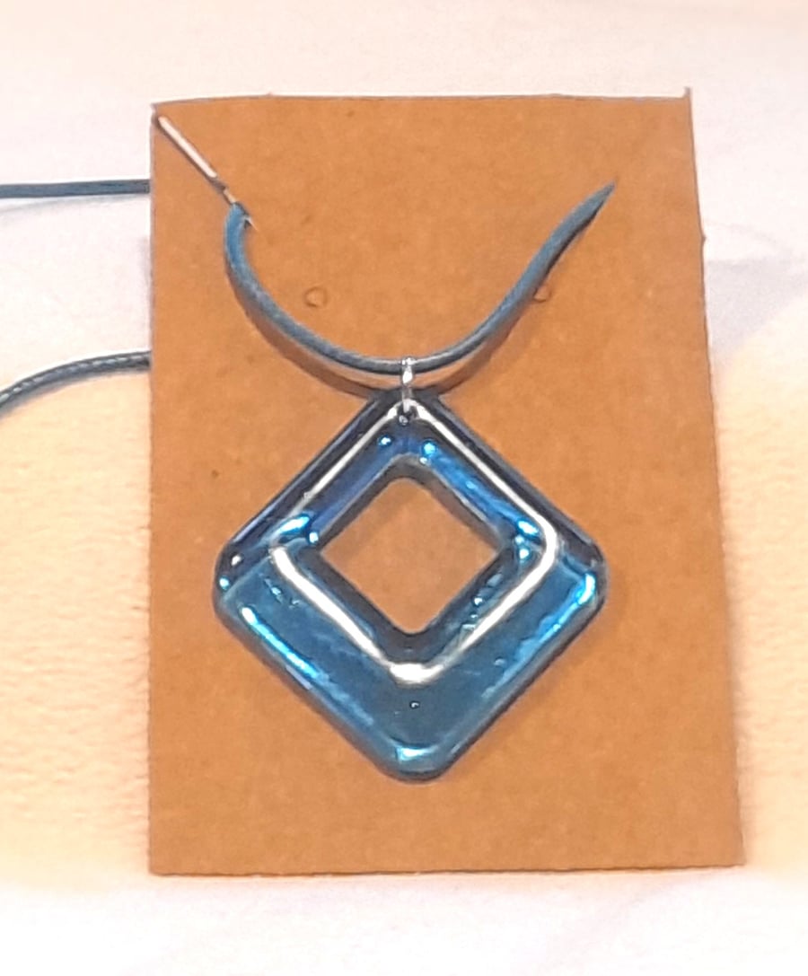 Blue acrylic diamond shaped pendant