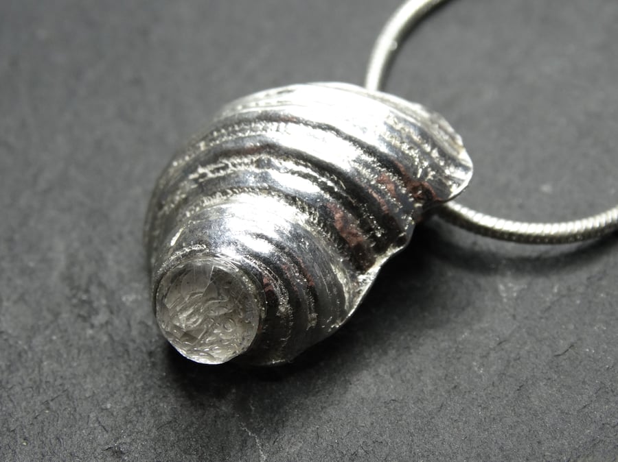 Krogen Pendant. Sterling silver shell cast with cubic zirconia
