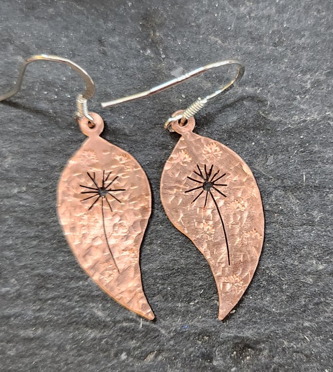 Copper leaf earrings with pierced dandelion clock design