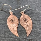 Copper leaf earrings with pierced dandelion clock design