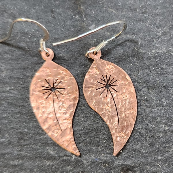 Copper leaf earrings with pierced dandelion clock design
