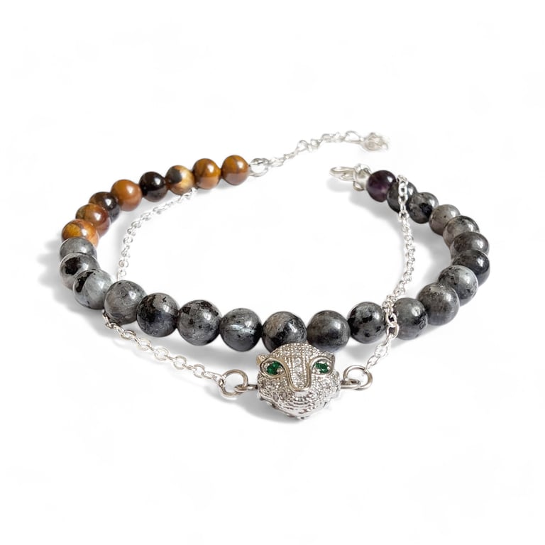 Black lava stones necklace with gold spacer beads and a black and gold pedant.  