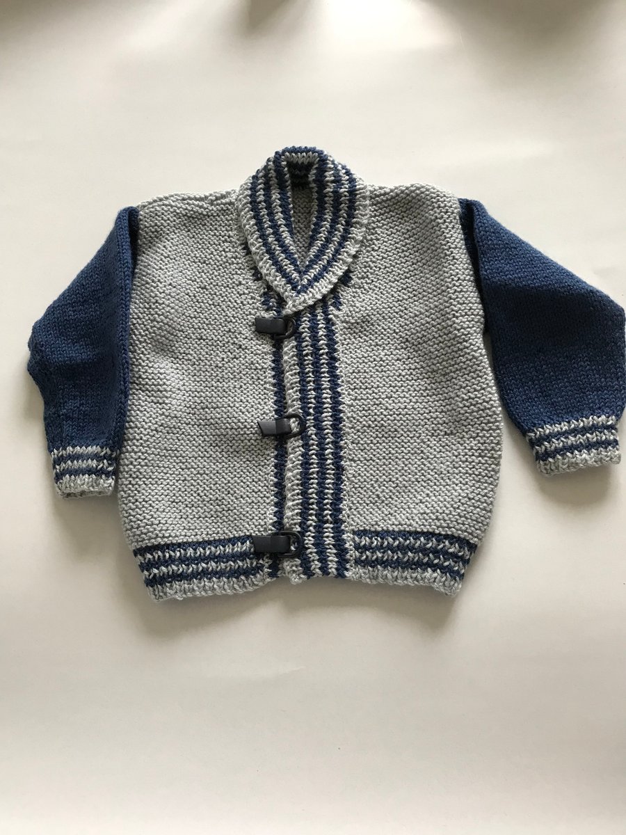 Hand knitted smart jacket for a 1 year old