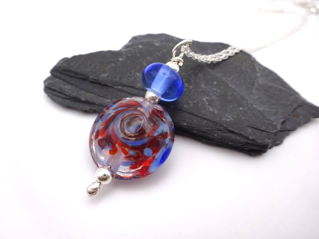 red orange and blue swirl lampwork glass pendant necklace
