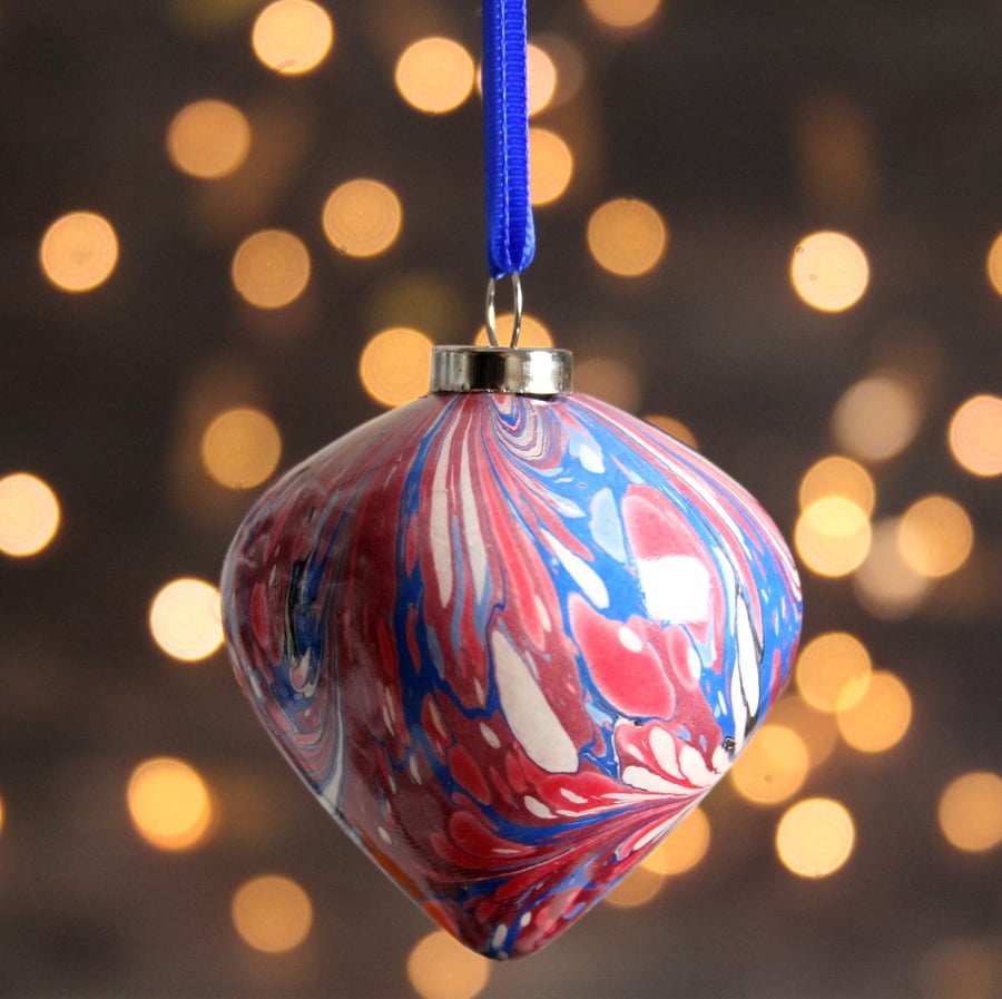 Marbled ceramic Christmas bauble in red and blue