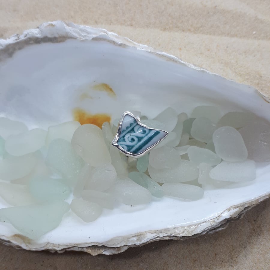 Green and white sea pottery ring