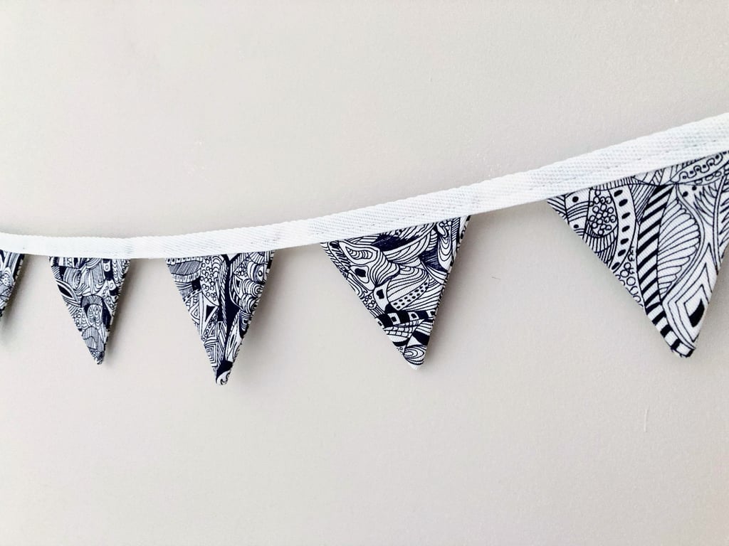 Navy blue and white patterned mini bunting. Double sided fabric.