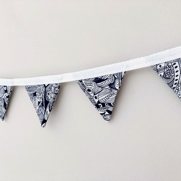 Navy blue and white patterned mini bunting. Double sided fabric.