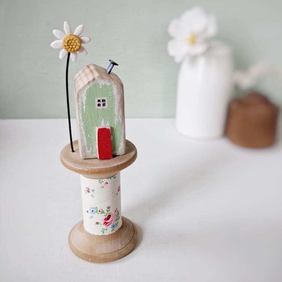 Wooden House on a Vintage Floral Bobbin with Clay Daisy