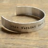 When Nothing Goes Right Hand Stamped Aluminium Cuff Bracelet