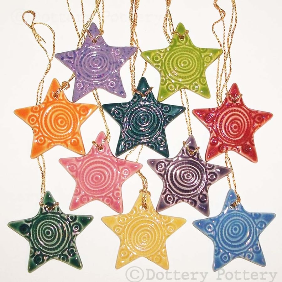 Brightly coloured ceramic star Christmas decorations - lucky dip.