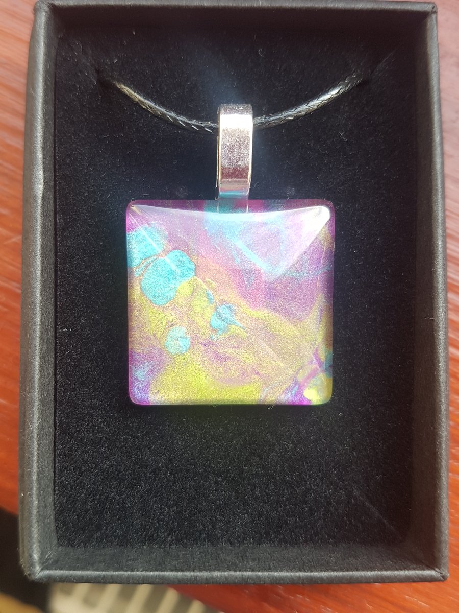Glass abstract pendant eye catching.