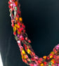 Crocheted necklace, lightweight, in shades of pink, purple, yellow and green - Image 4