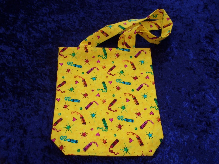 Bright Yellow Fabric Bag with Crayons