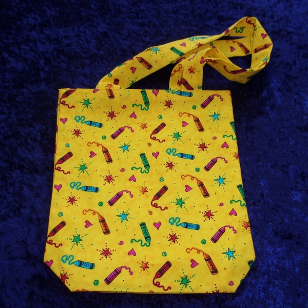 Bright Yellow Fabric Bag with Crayons