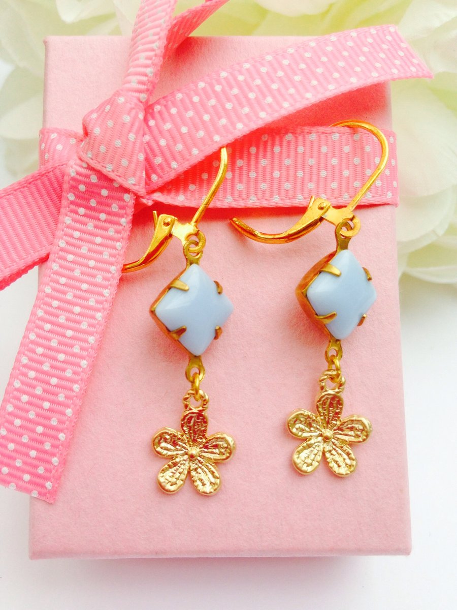 Vintage glass earrings , light opaque lavender  blue with gold flower