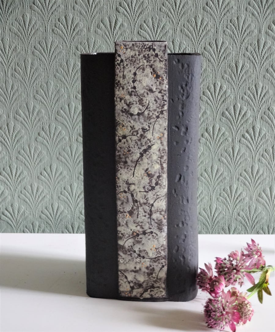 Josef.  Unusual black textured ceramic art vase, cream panels, abstract motifs.