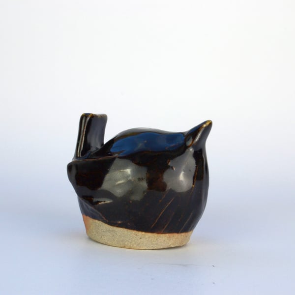 Shiny black ceramic wren