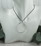 Large Silver Circle Necklace on Black Cotton Cord - Image 5