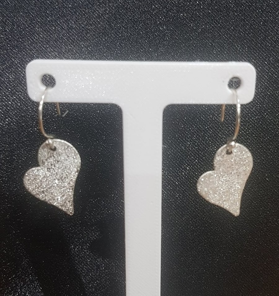 Handmade sterling silver 'stardust' textured heart earrings