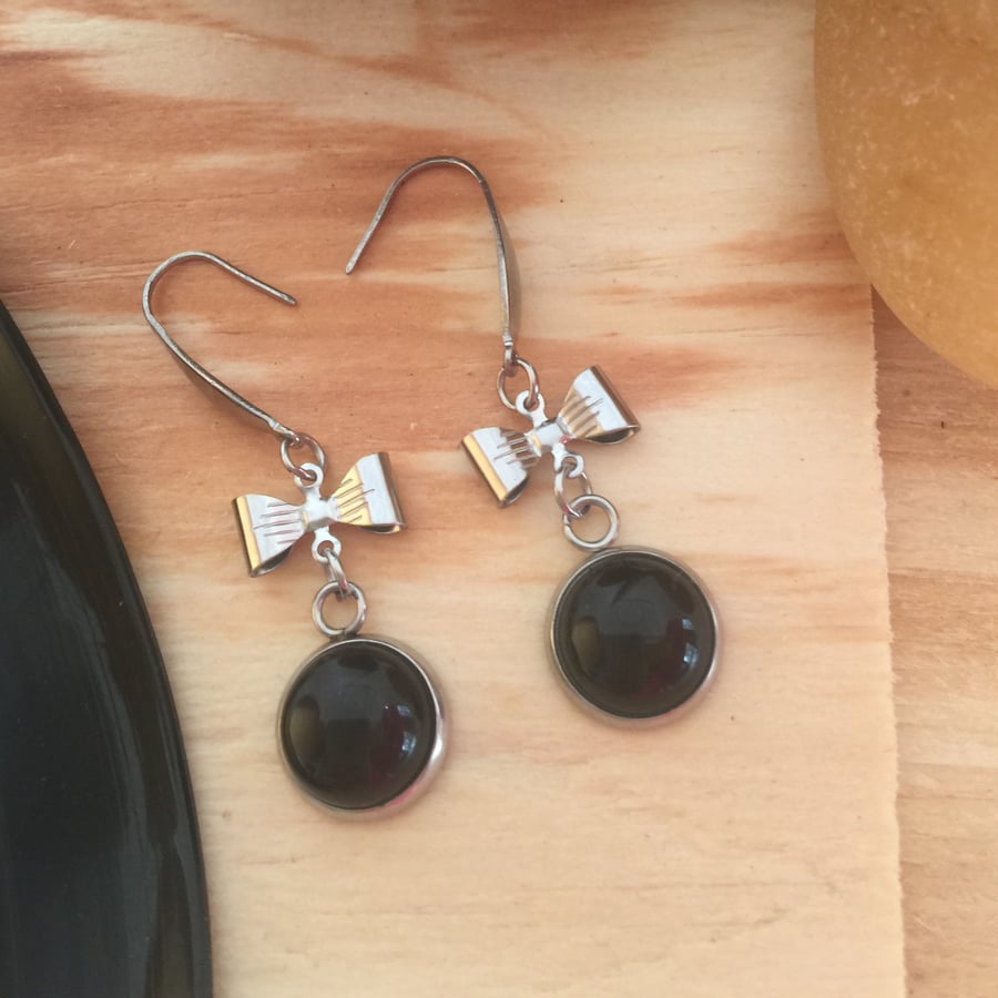 Stainless Steel Bow and Onyx Dangle Earrings