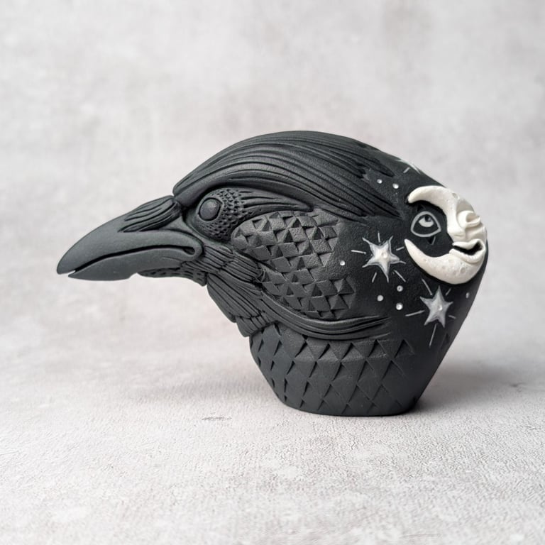 'Astrum', a black porcelain crow idol.