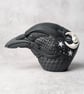 'Astrum', a black porcelain crow idol.