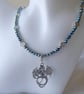 Blue-Green Faceted Bead Necklace with Dragon Pendant