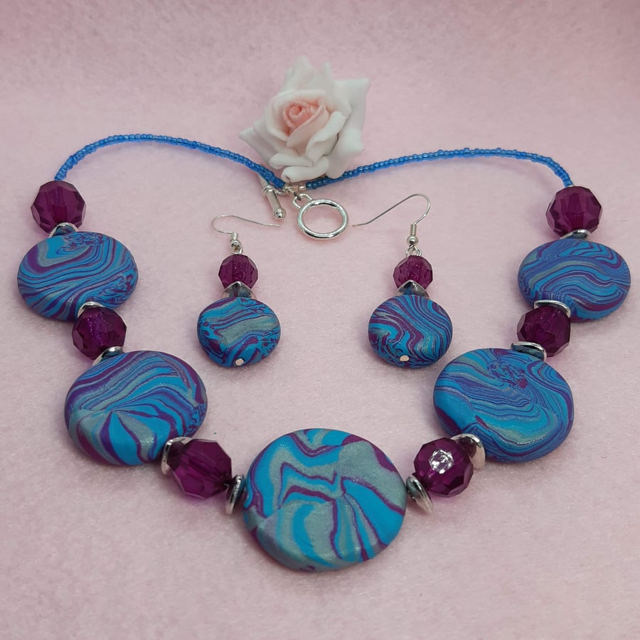 Magenta and turquoise disc-shaped necklace and earring set