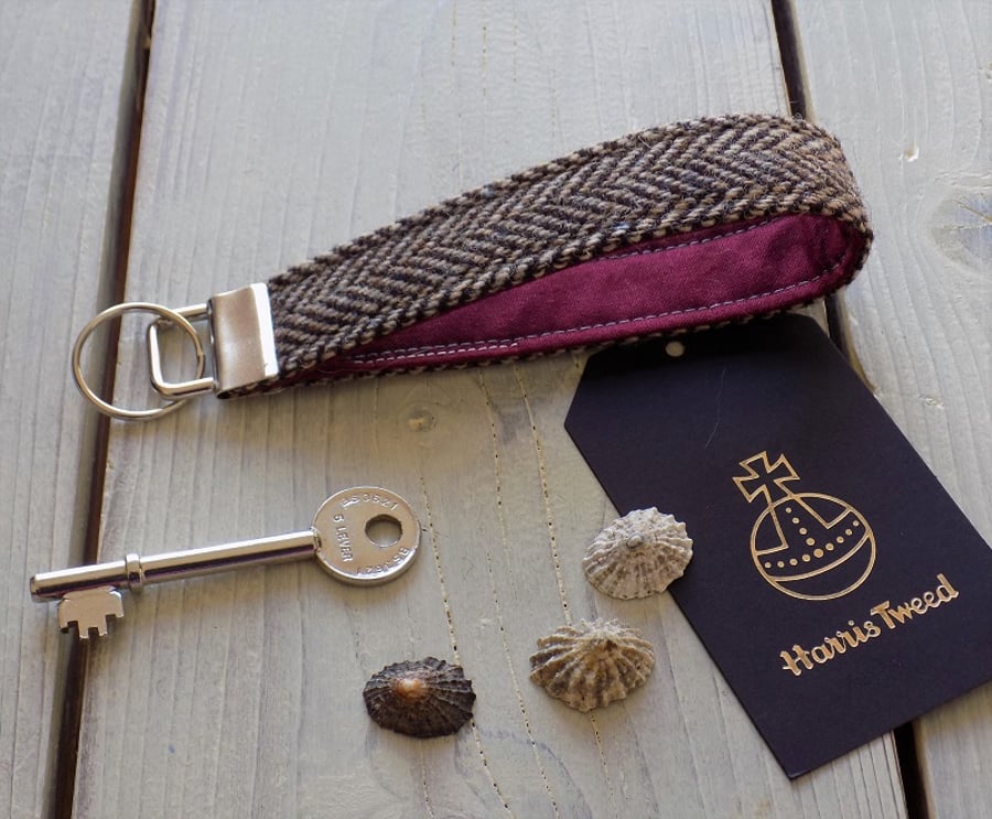 Harris Tweed key fob wrist strap in brown herringbone with crimson lining