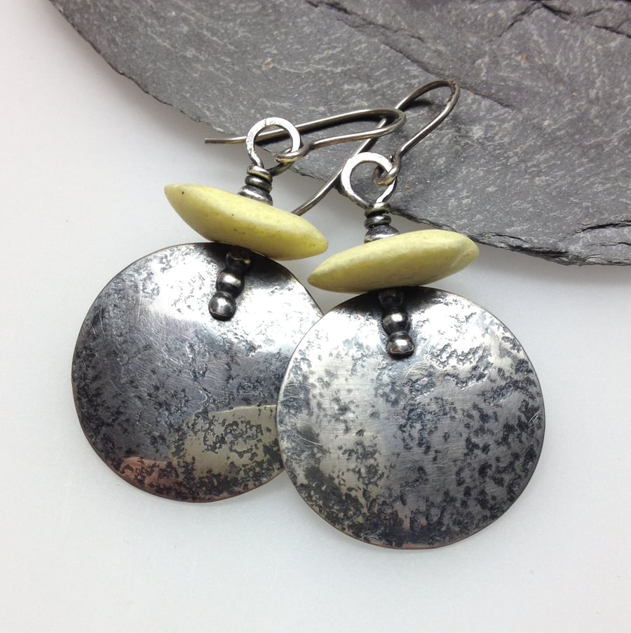 Large round oxidised silver and cream glass earrings 