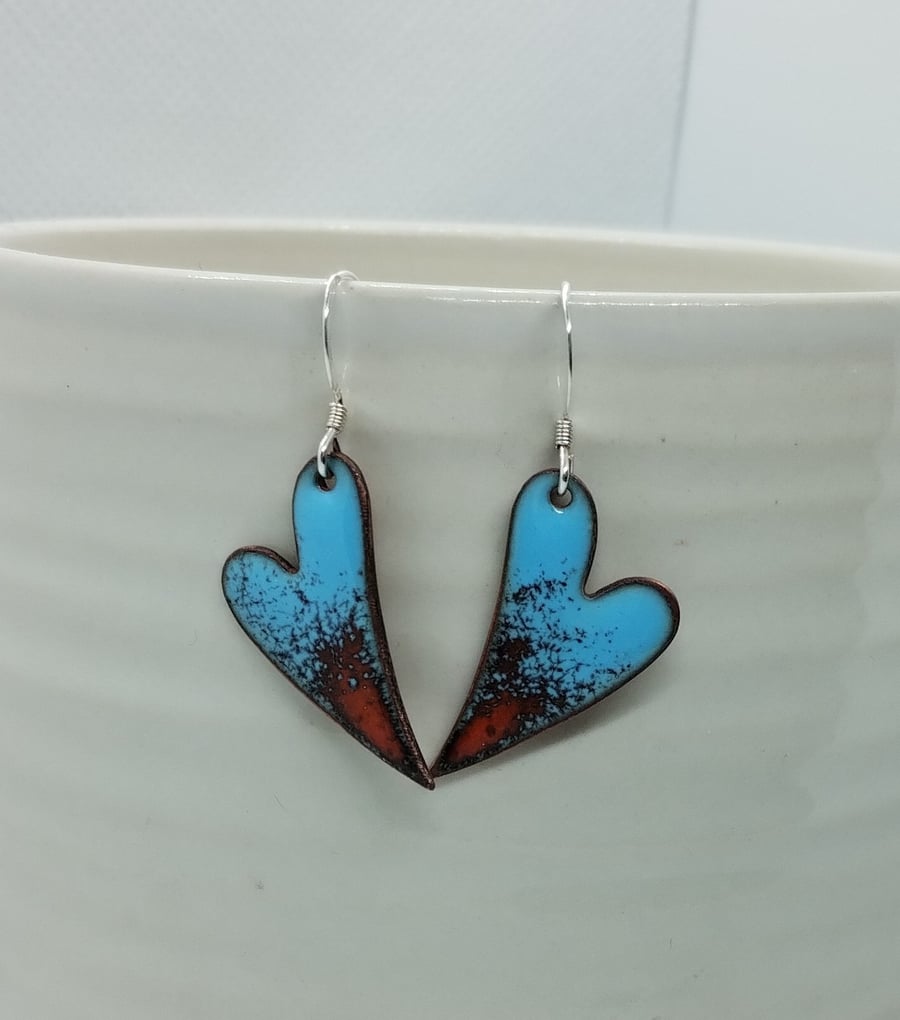 Pale blue and orange wild heart enamelled copper earrings