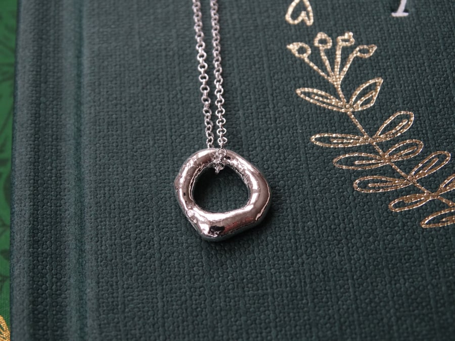 Silver charm pendant - molten silver pendant OOAK