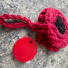 Poppy bag charm and trolley token