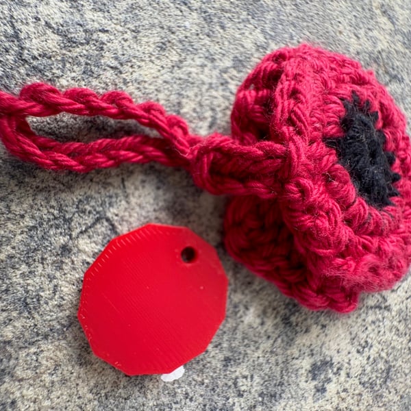Poppy bag charm and trolley token
