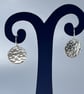 Silver round earrings with bubbles texture