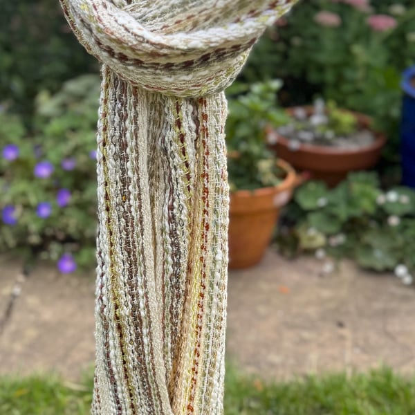 Stripey scarf in syncopated green, cream and rusty brown