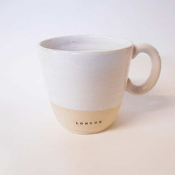 London Logo Mug with Shiny Tin white Glaze.