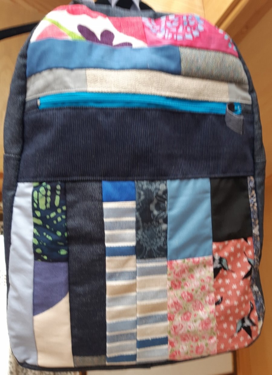 Navy denim patchwork backpack