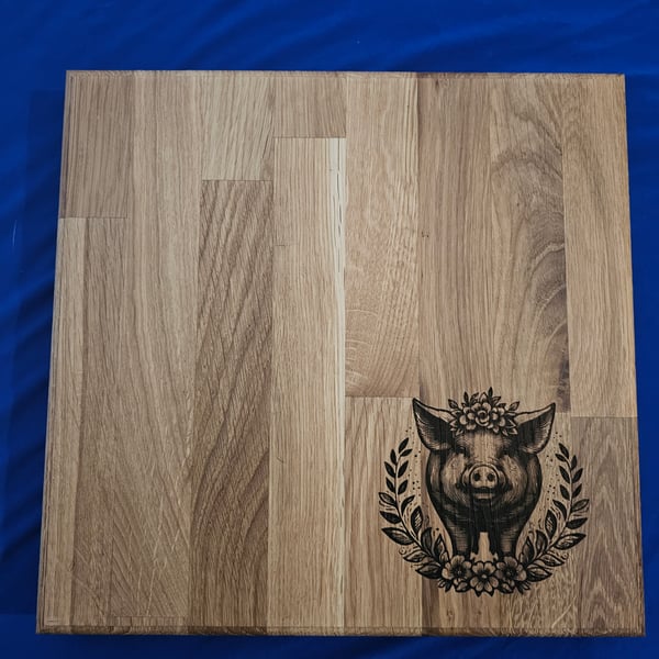 Oak chopping board laser engraved pig detail 