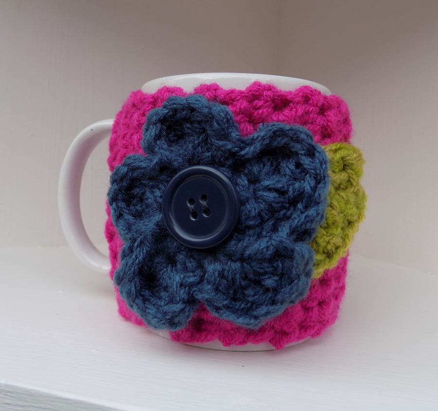 Mug with Chunky Hug Cosy with Large Crochet Flower Winter Berry Colours