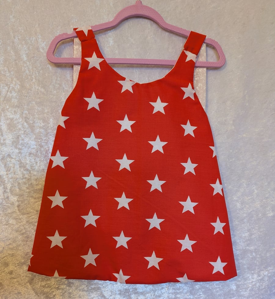 Reversible baby top. Red and white stars. Two years old.