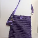 Handmade lined purple crochet t-shirt yarn crossbody bag with adjustable straps